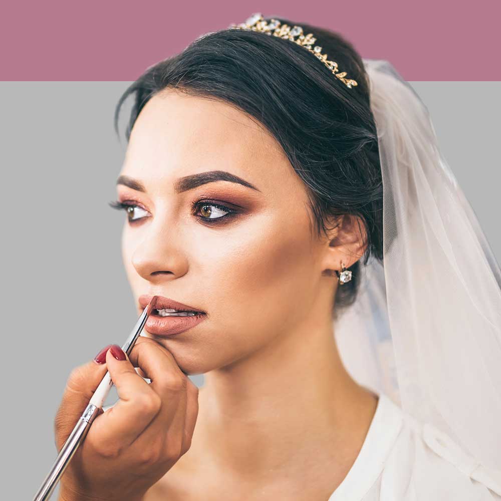 Bride getting her makeup done