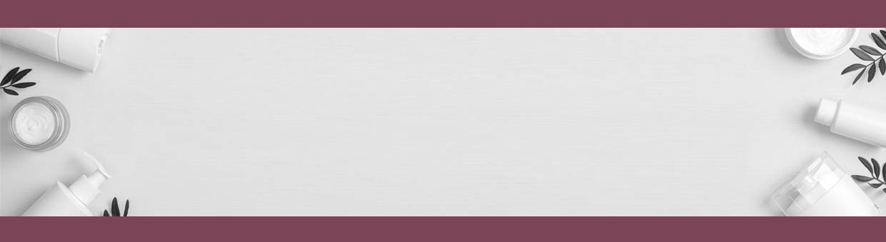 Face Lotions on grey background